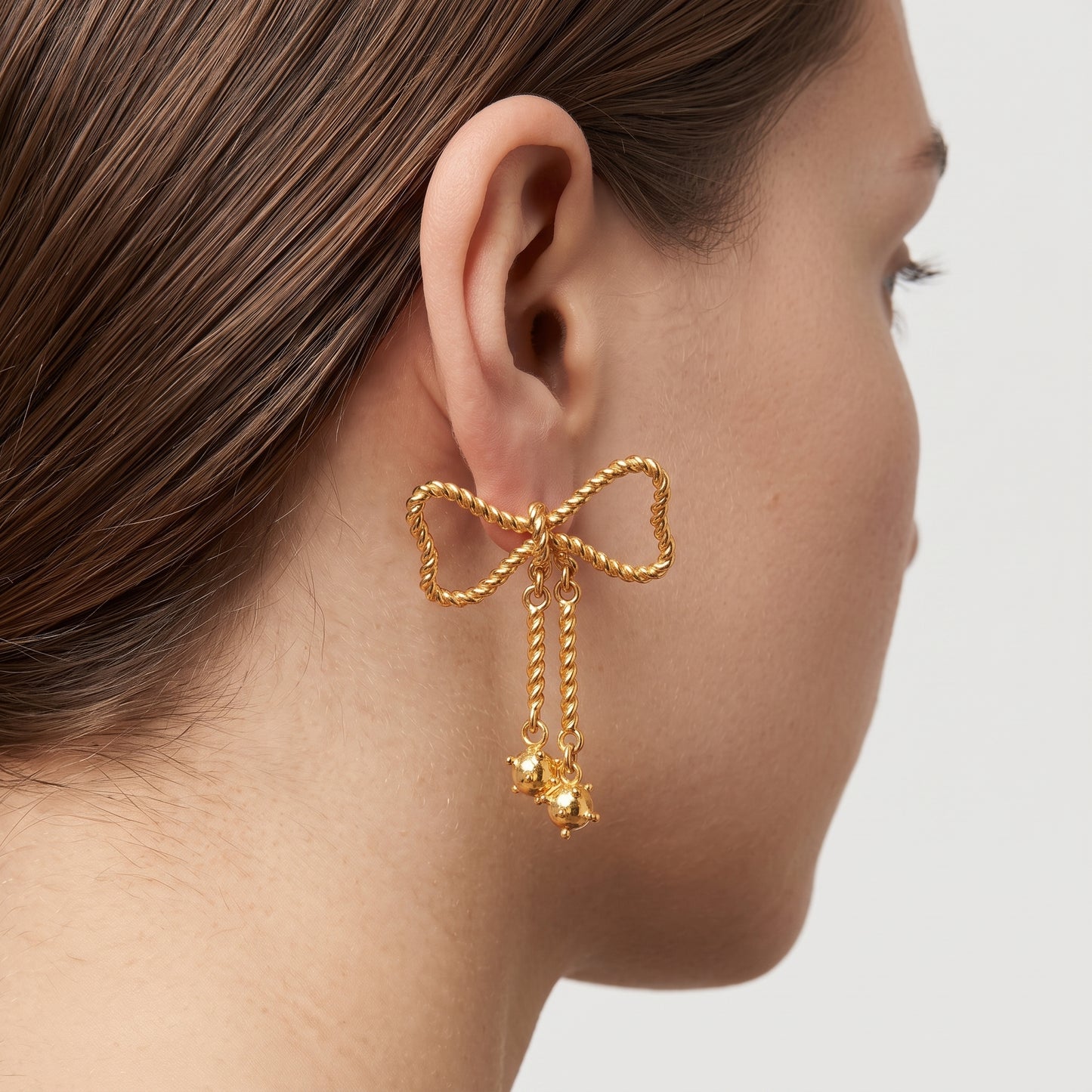 Twisted Gold Bow Drop Earrings