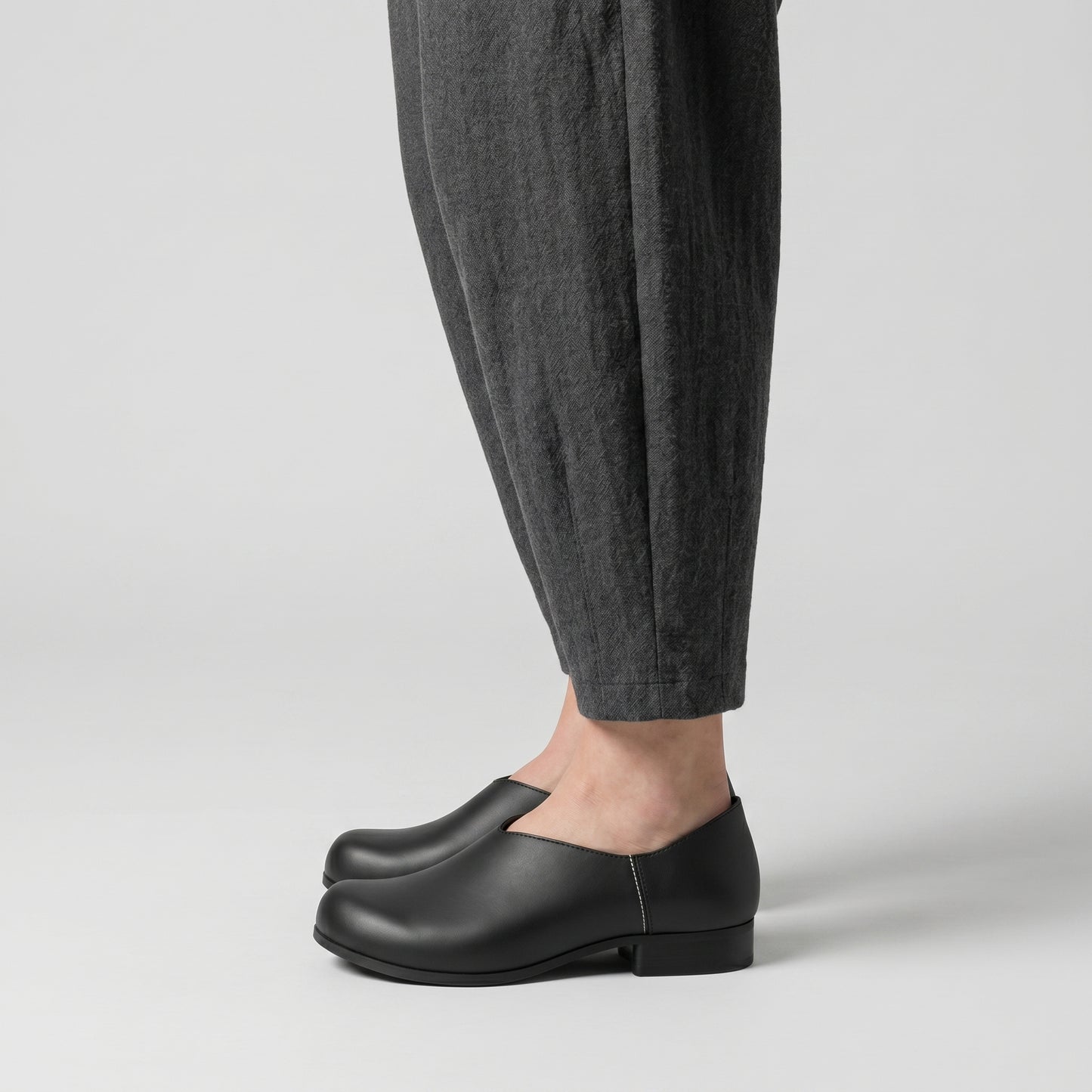 Minimalist Black Leather Slip-Ons