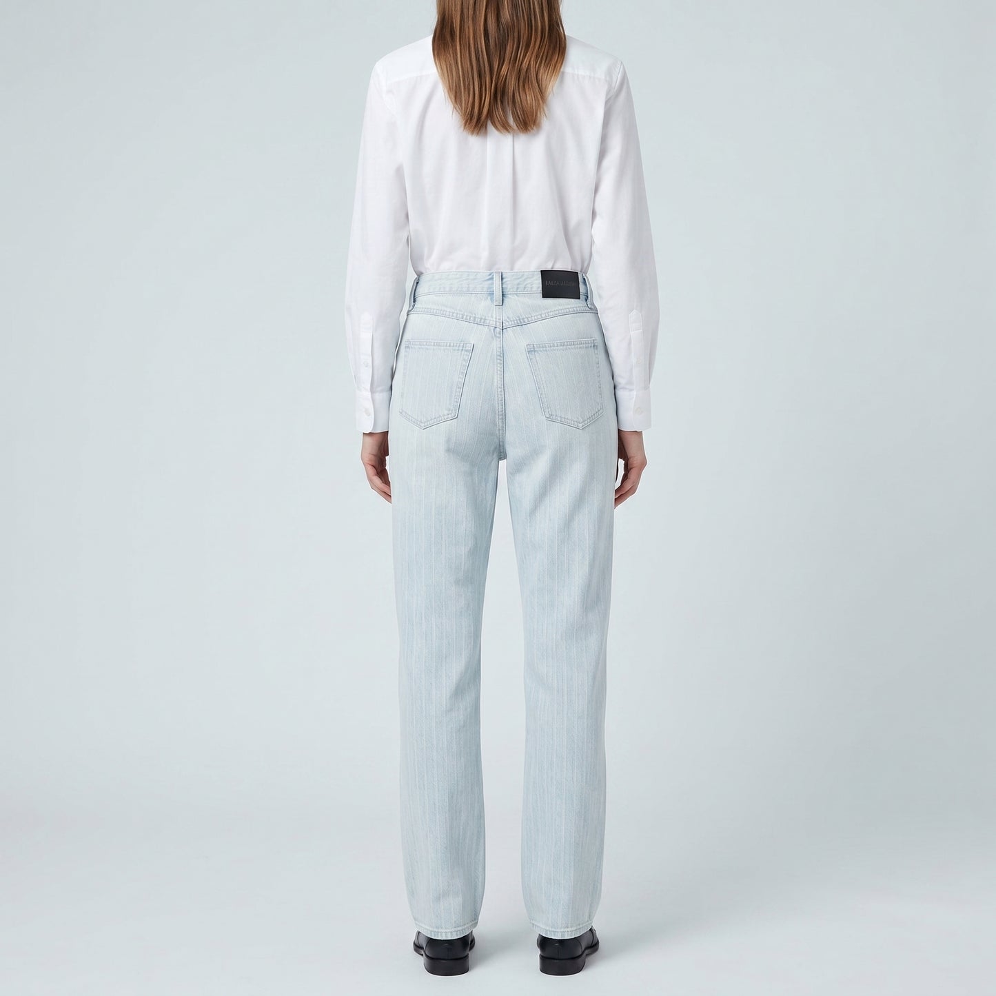 Asymmetric Light Wash Denim Jeans