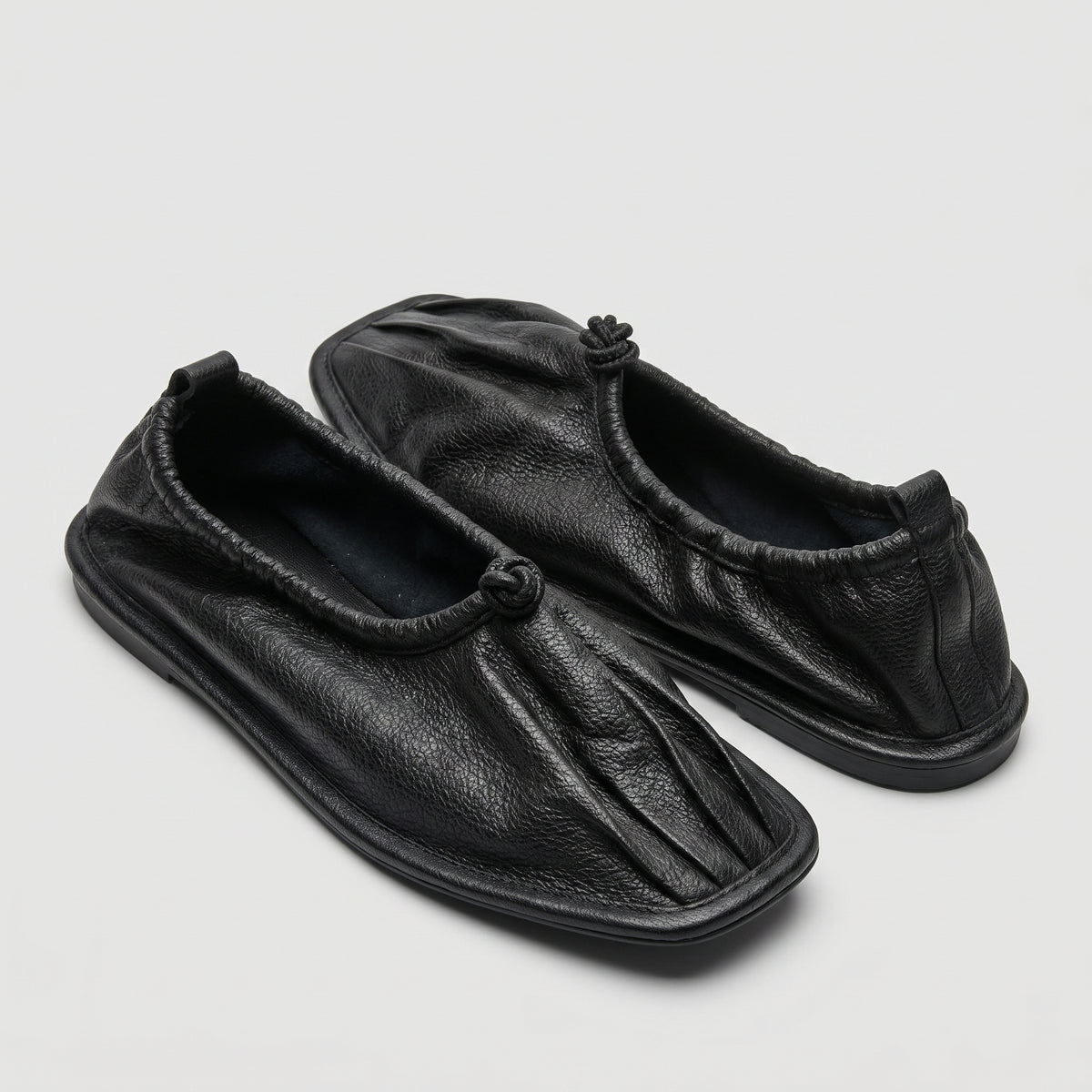 Supple Leather Ruched Flats