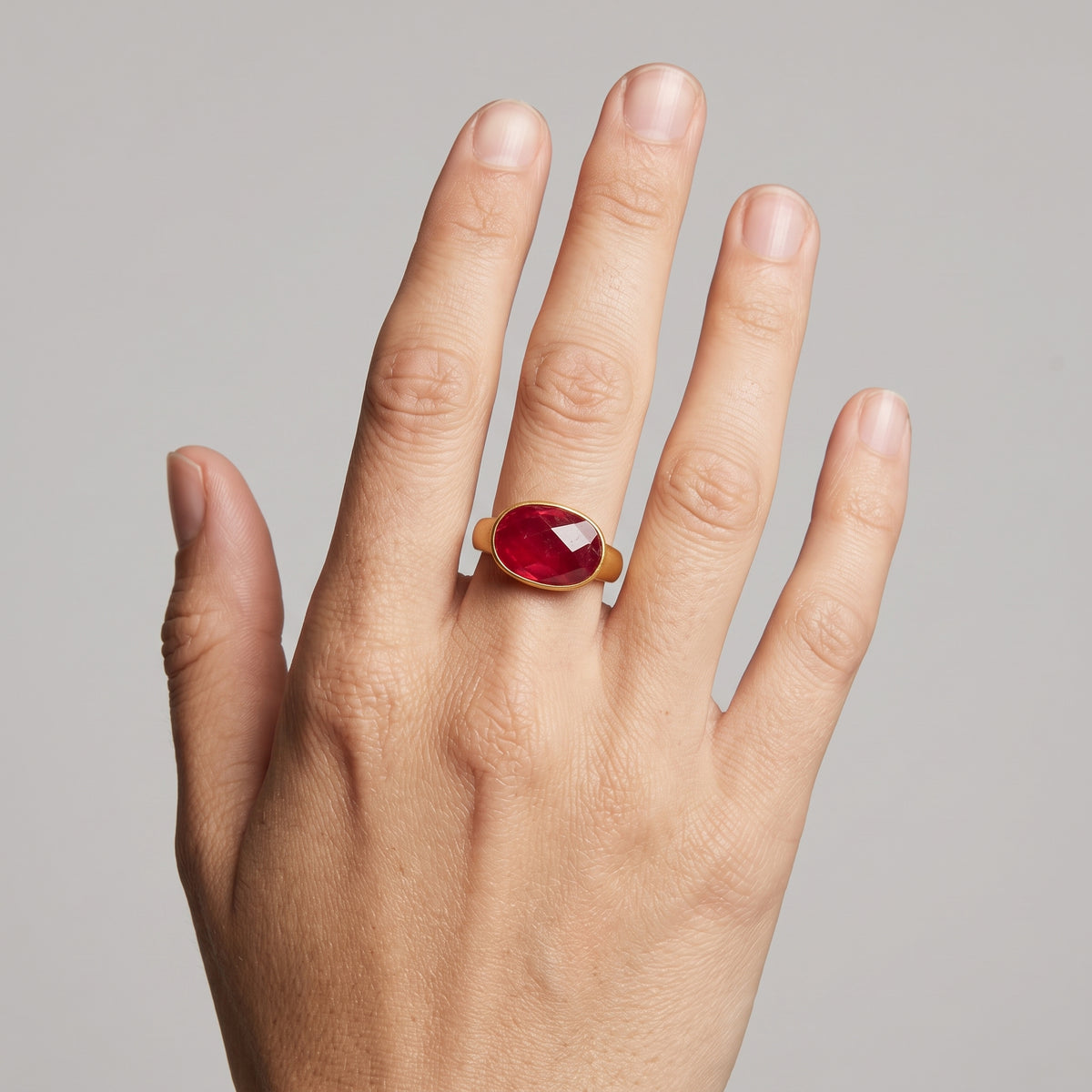 Oval Faceted Ruby Gold Ring