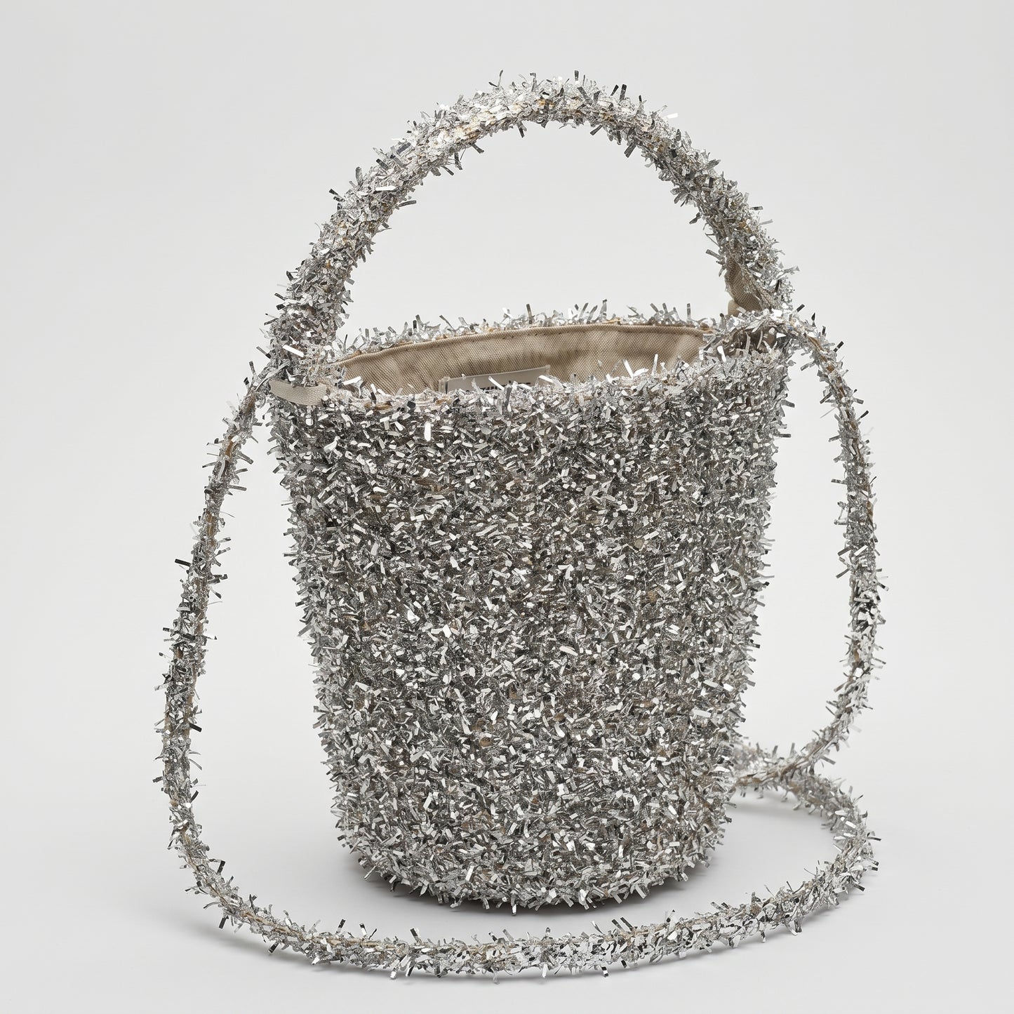 Shimmering Metallic Fringe Bucket Bag