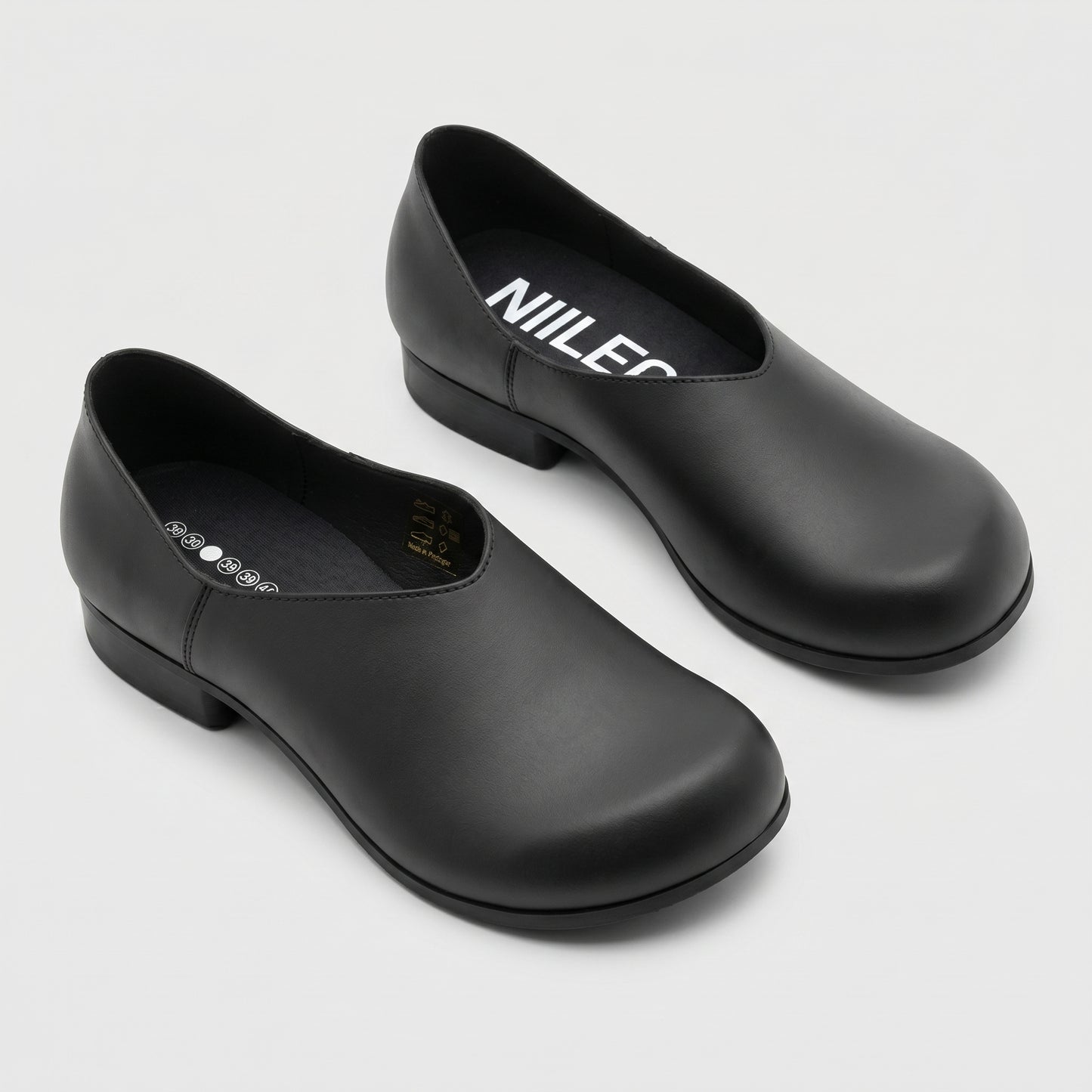 Minimalist Black Leather Slip-Ons