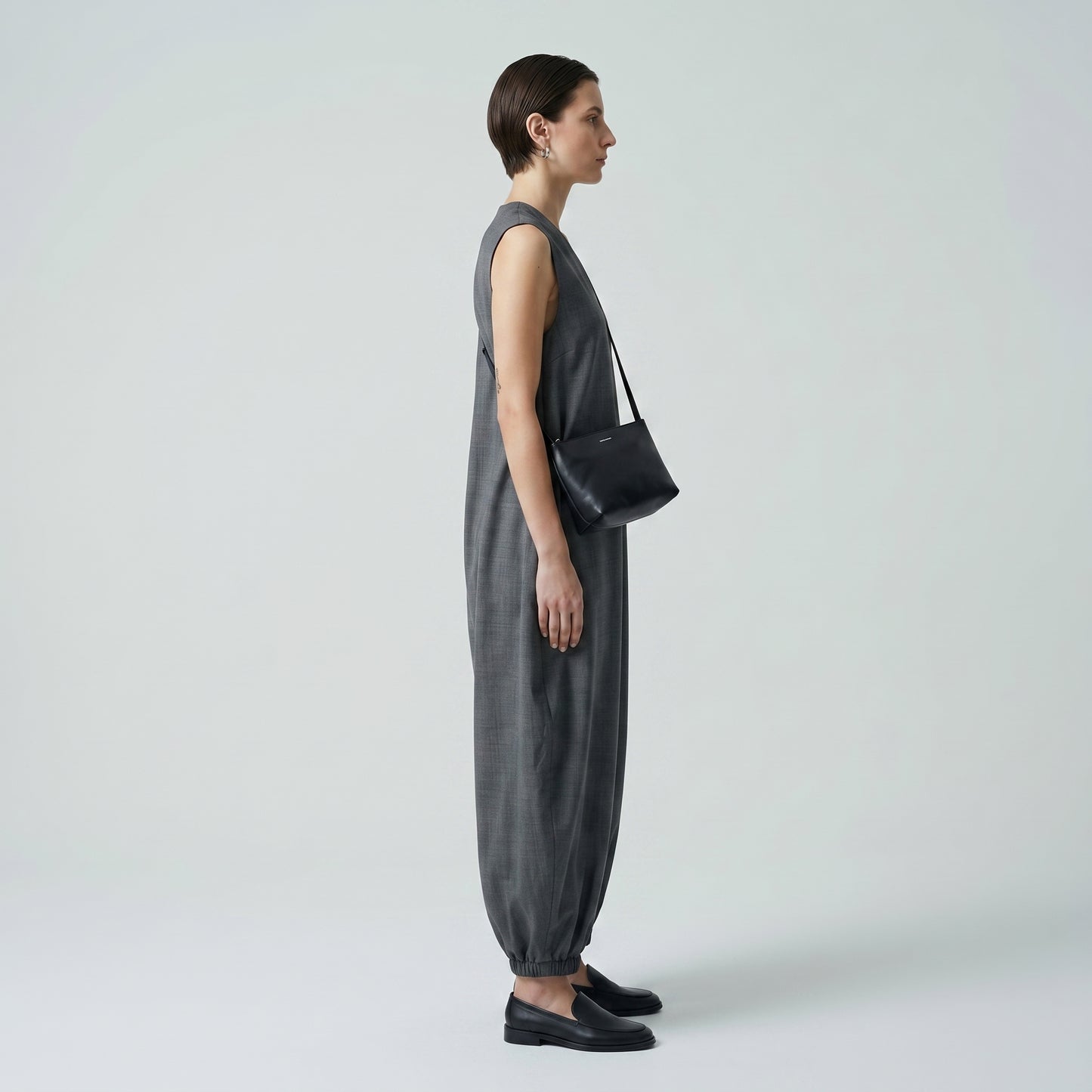 Architectural V-Neck Tapered Jumpsuit