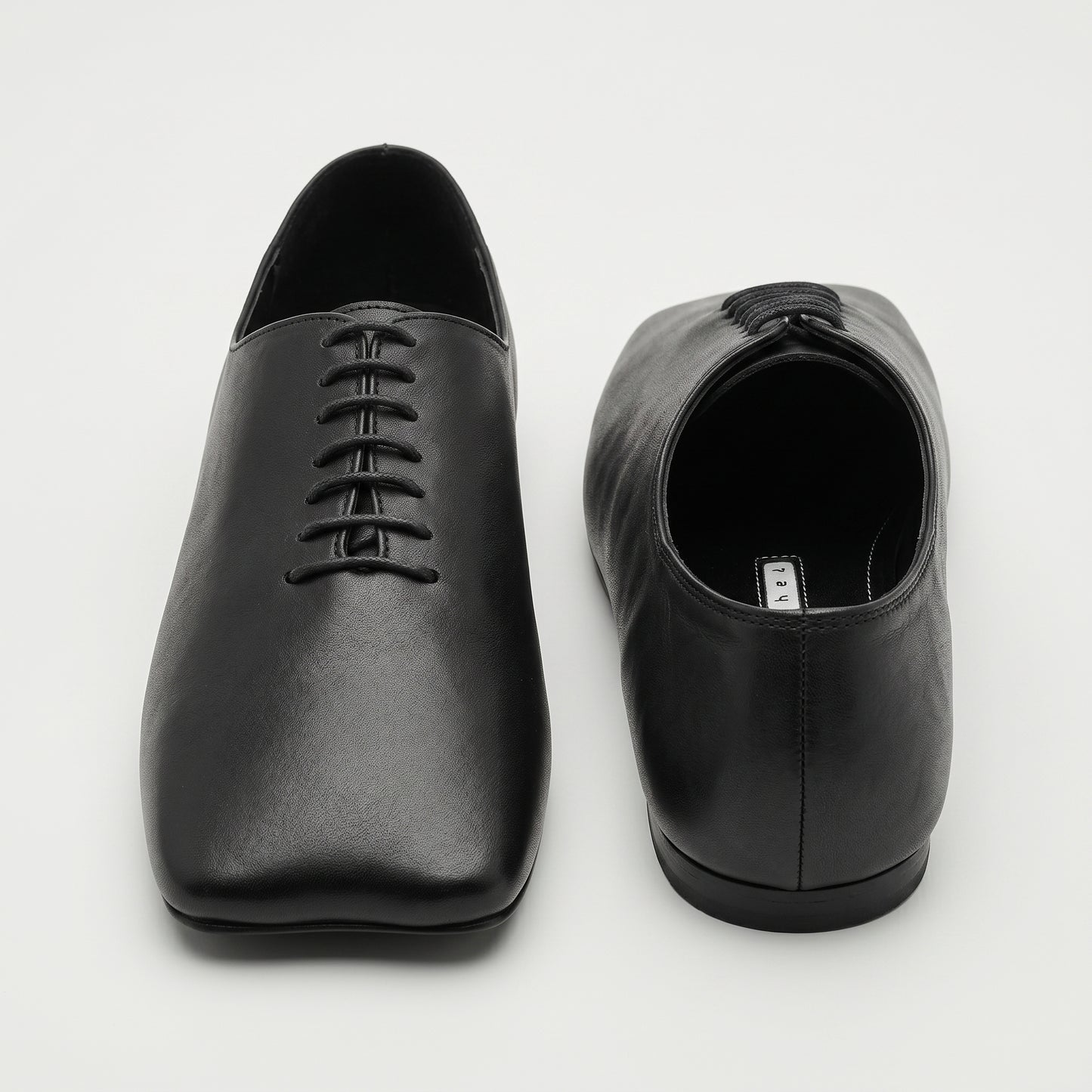 Minimalist Black Leather Oxfords
