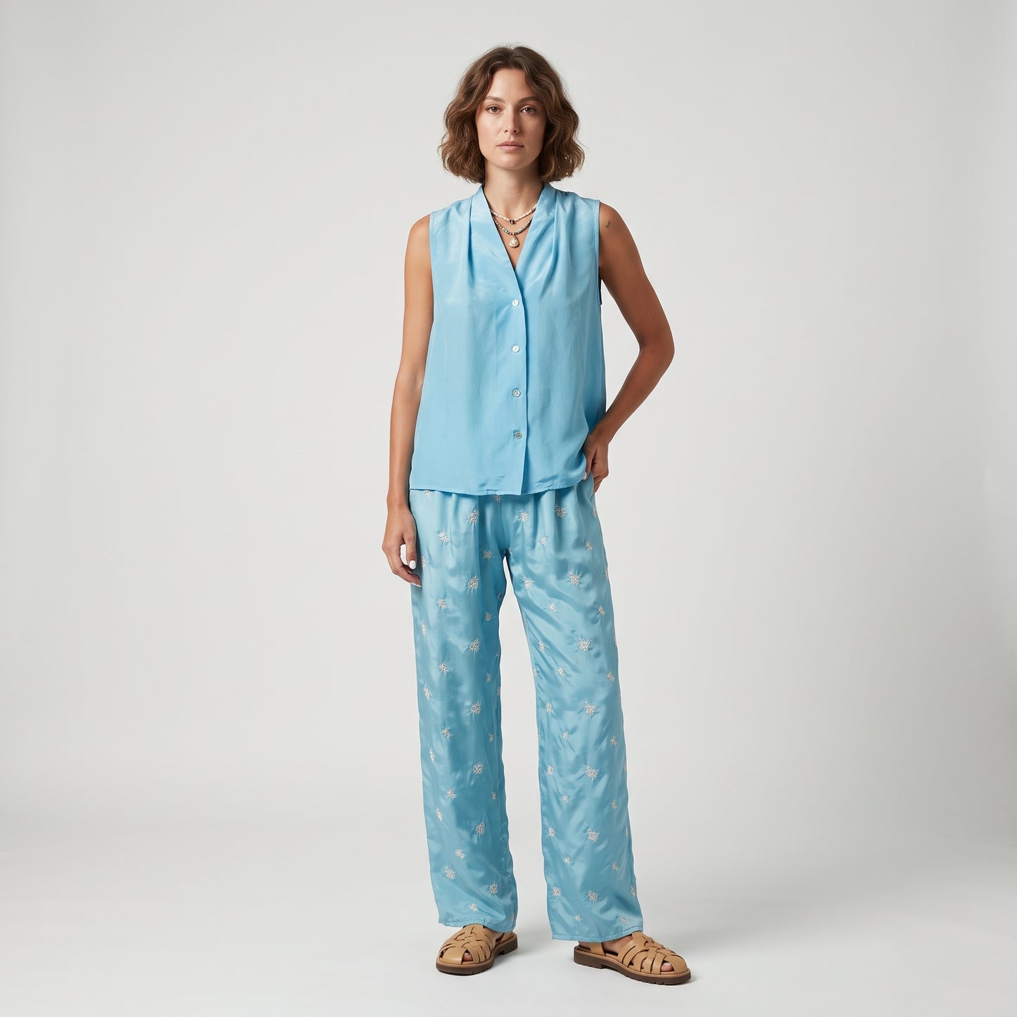 Sleeveless V-Neck Buttoned Blouse
