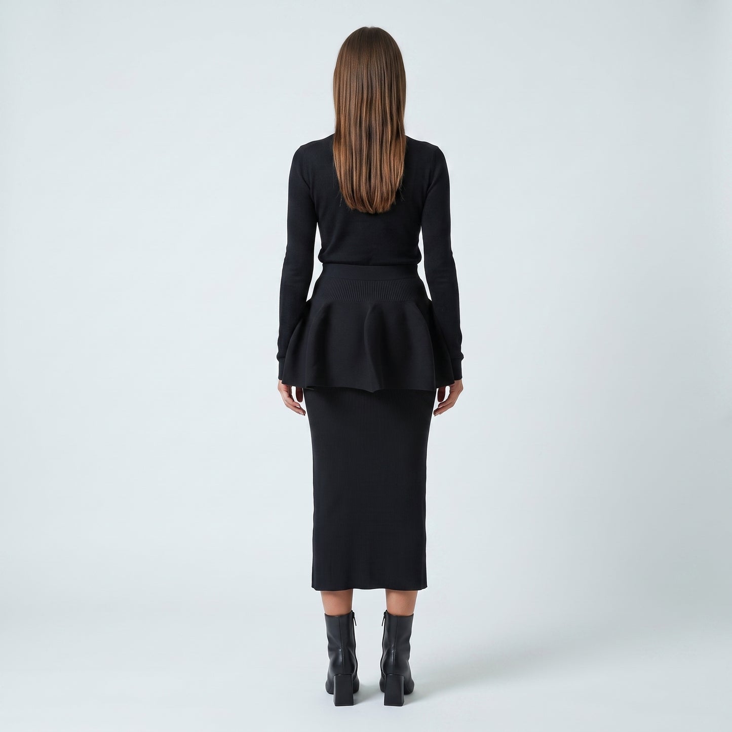 Architectural Peplum Ribbed Knit Top