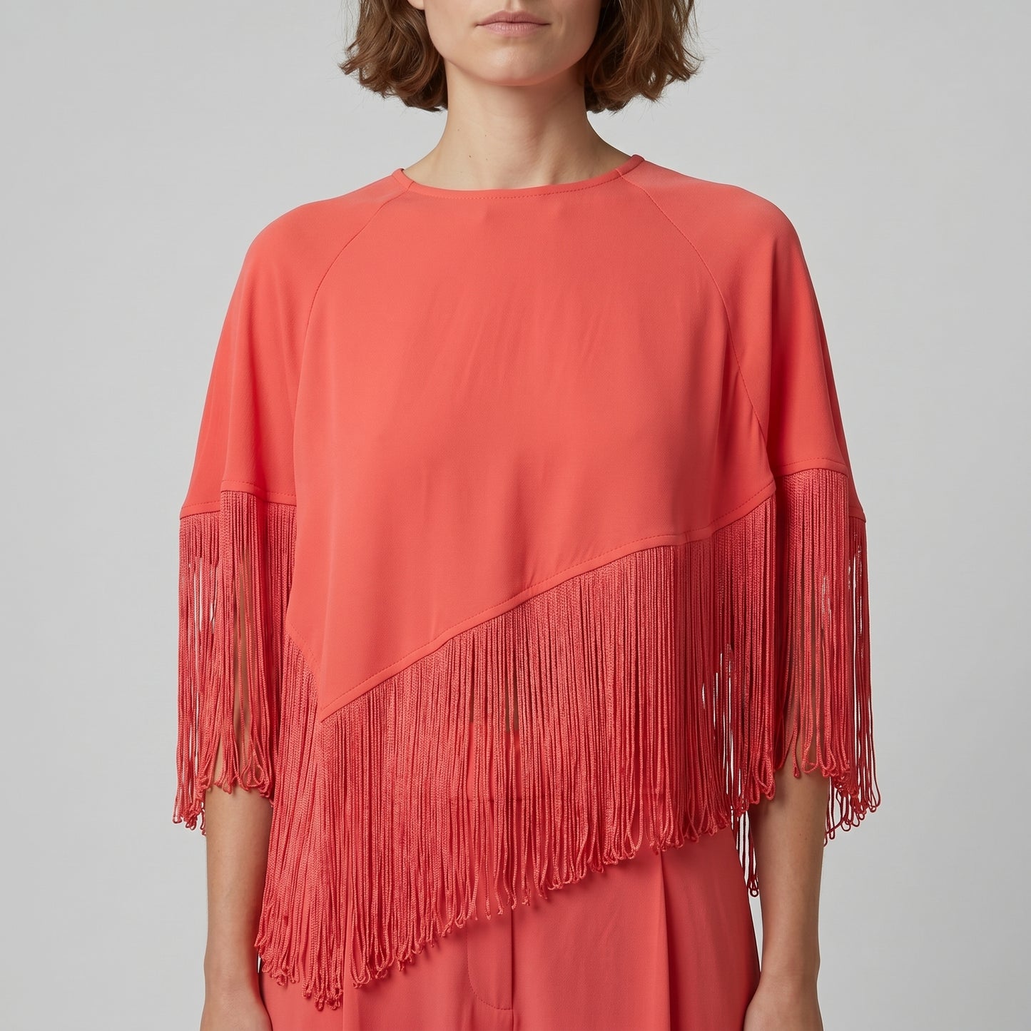 Asymmetric Fringe Coral Blouse