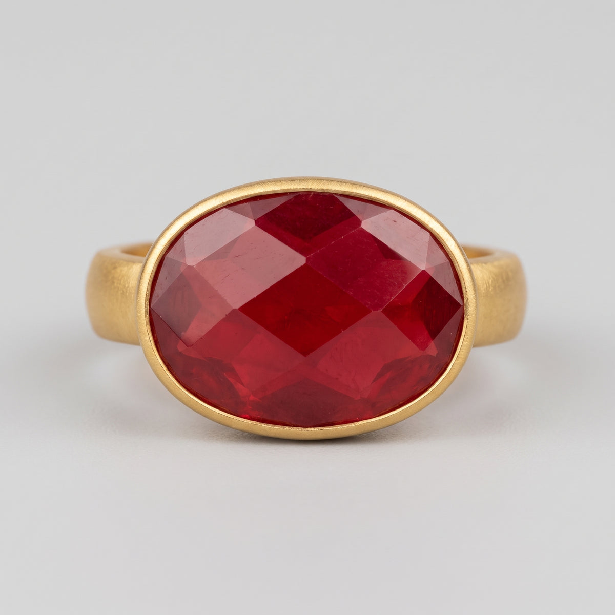 Oval Faceted Ruby Gold Ring