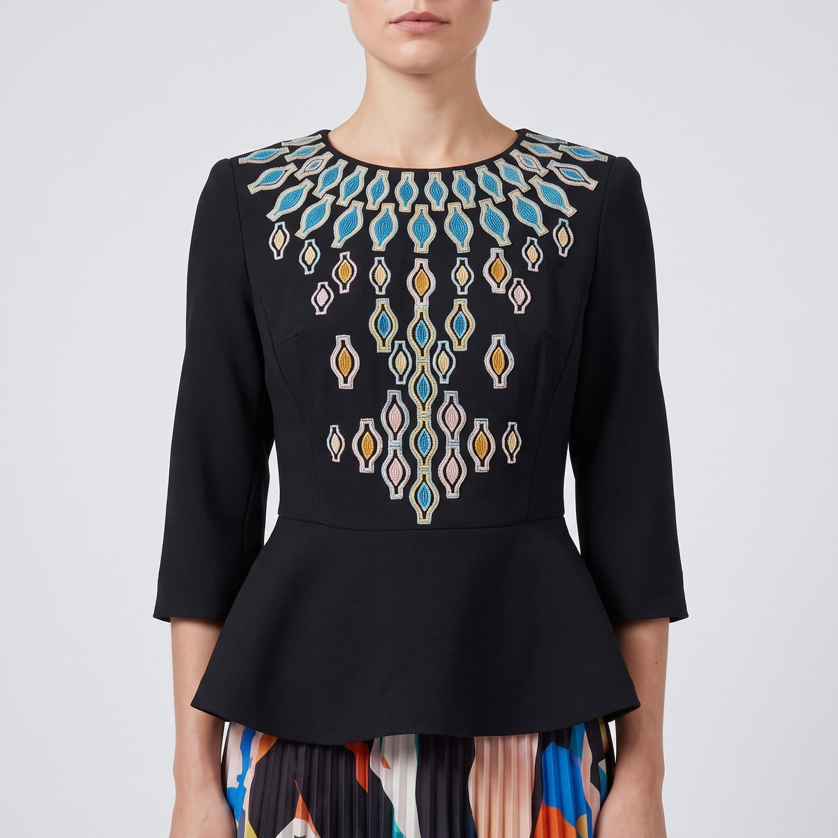 Embroidered Peplum Structured Top