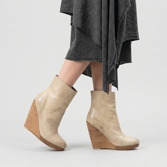 Sculptural Leather Wedge Ankle Boots
