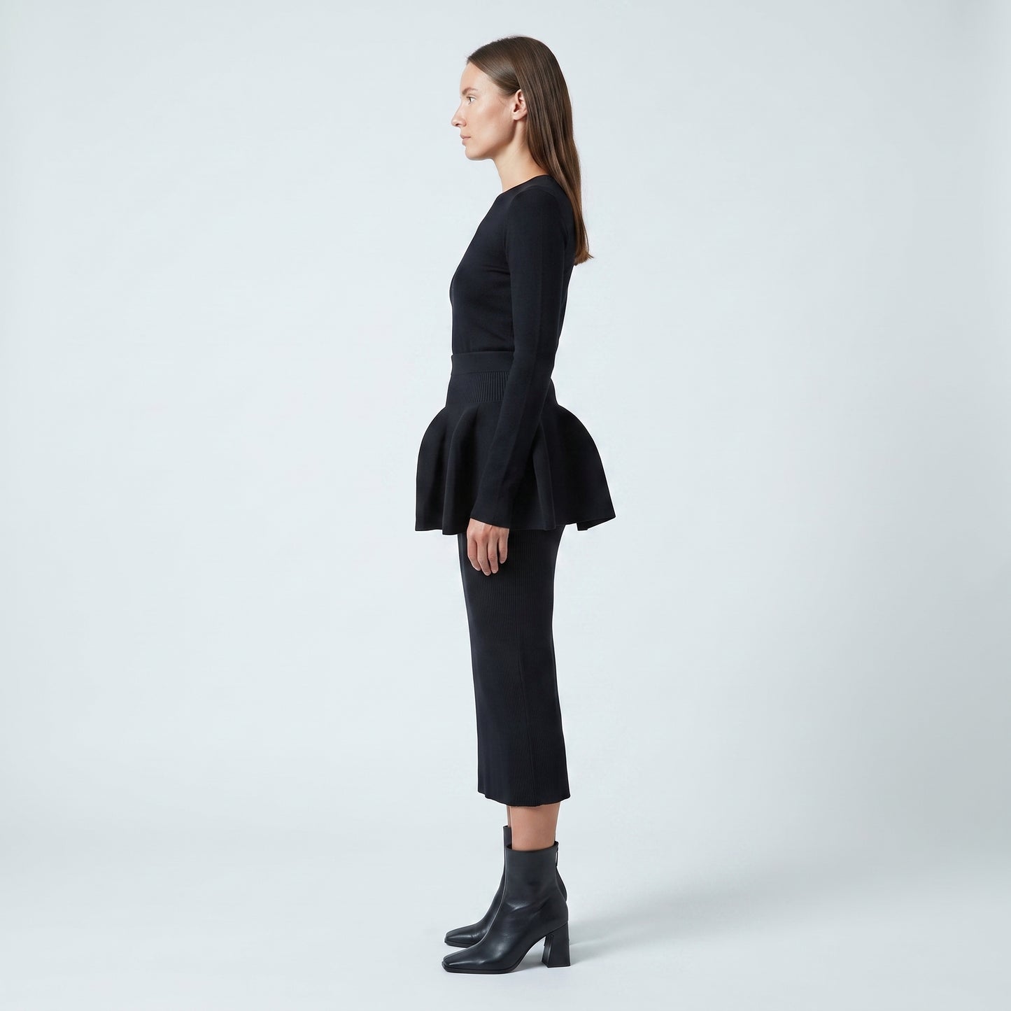 Architectural Peplum Ribbed Knit Top