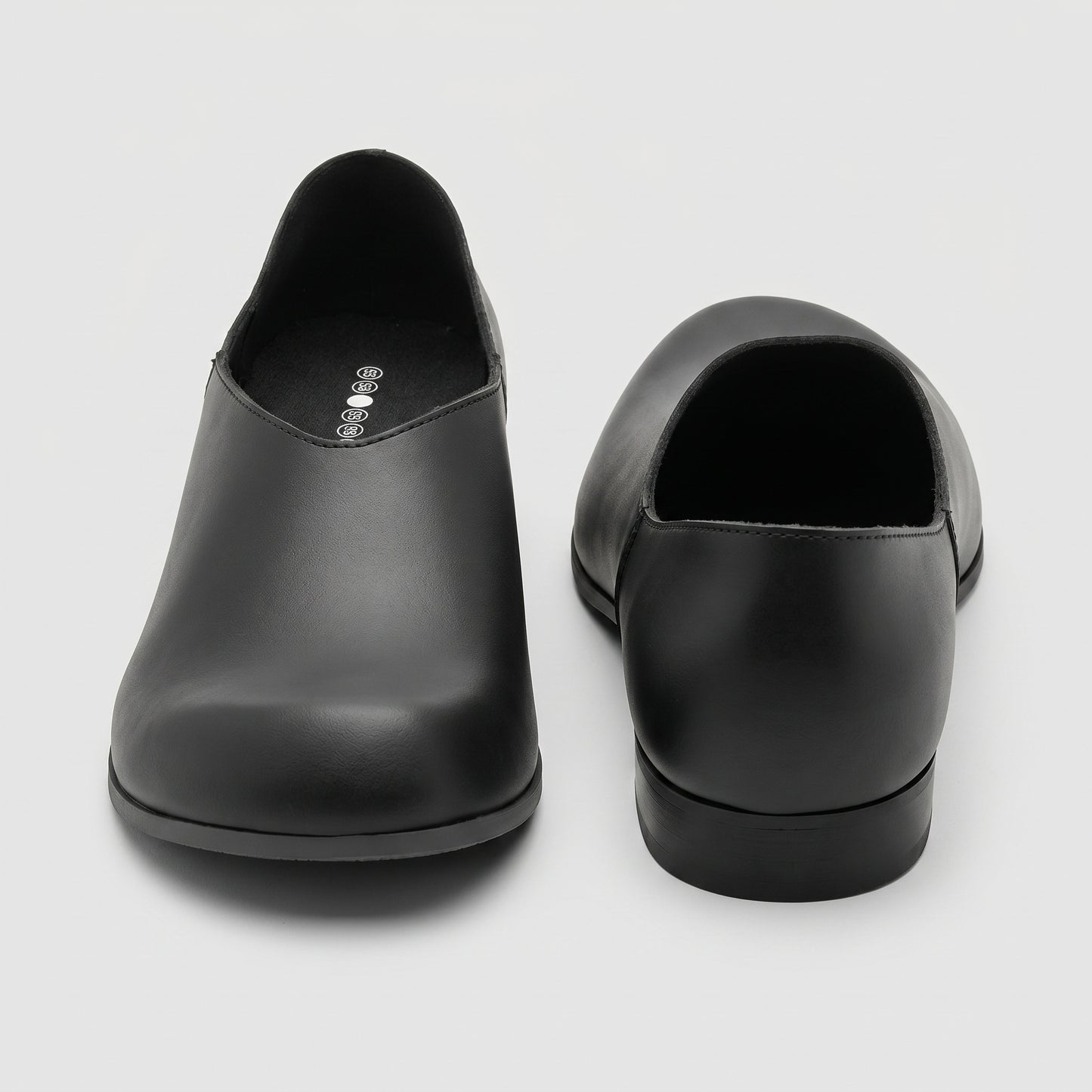 Minimalist Black Leather Slip-Ons