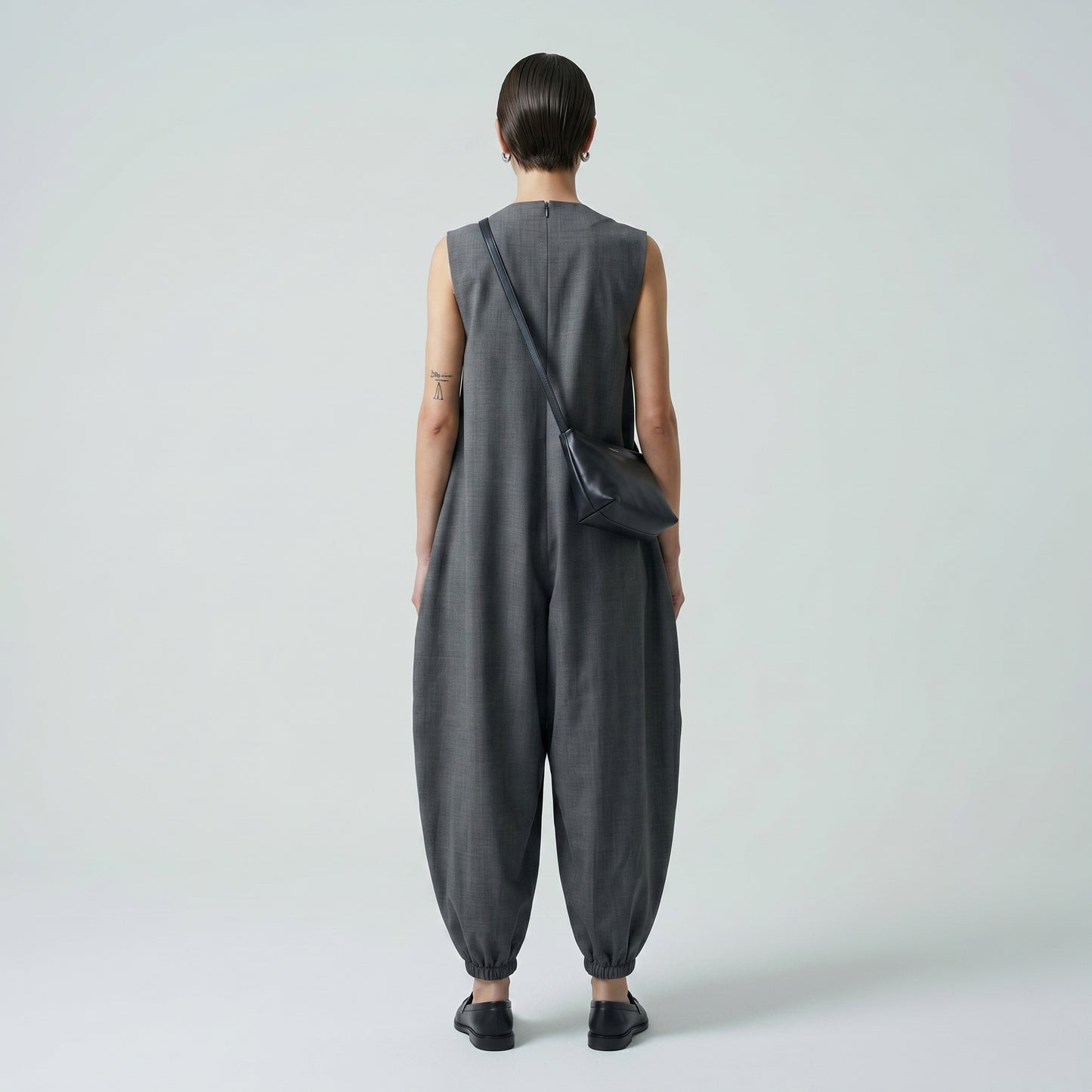 Architectural V-Neck Tapered Jumpsuit