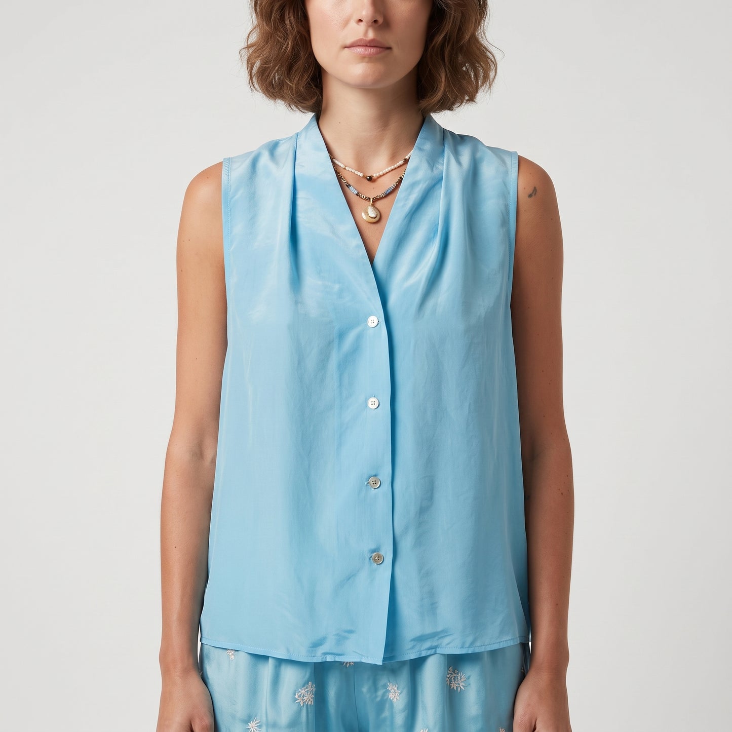 Sleeveless V-Neck Buttoned Blouse