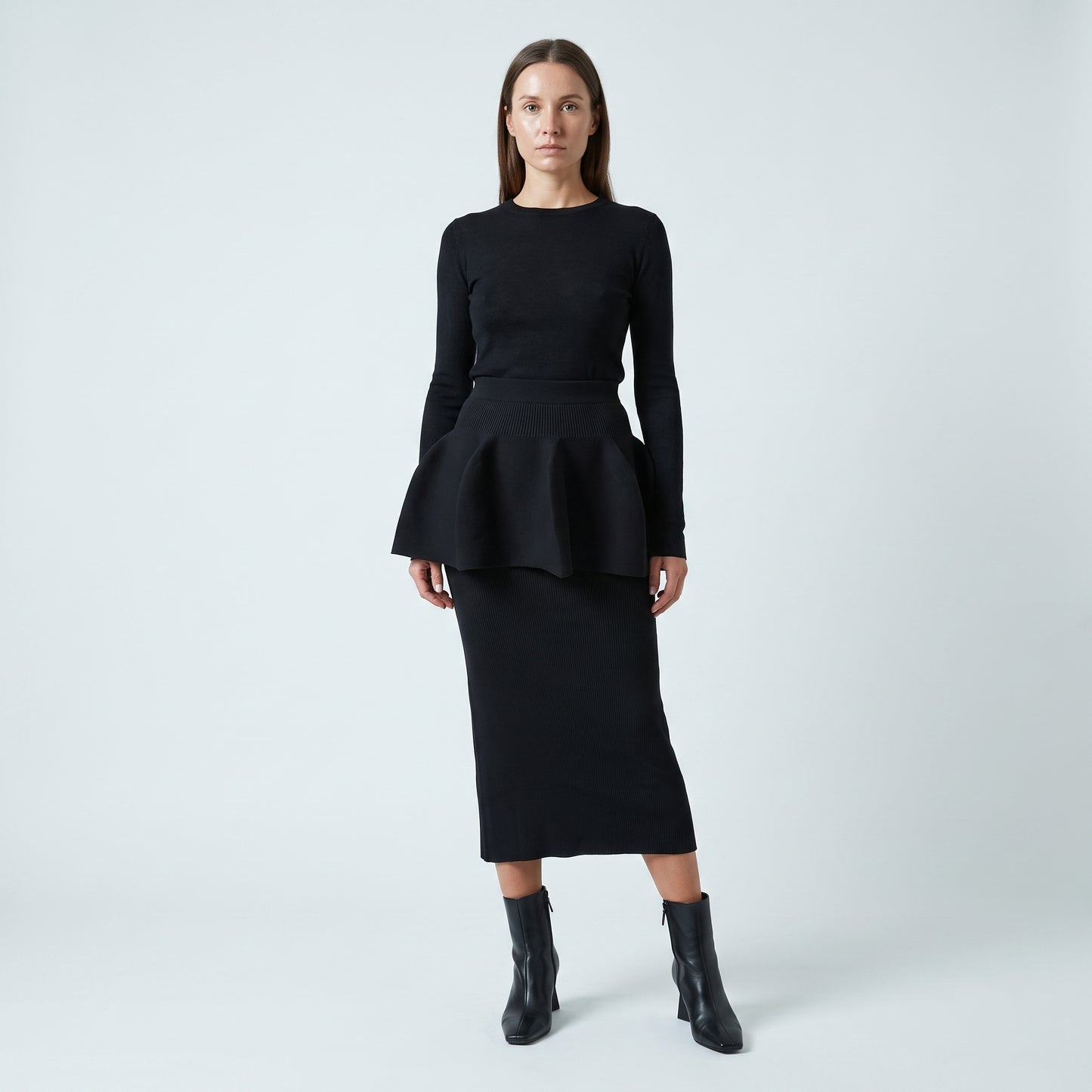 Architectural Peplum Ribbed Knit Top