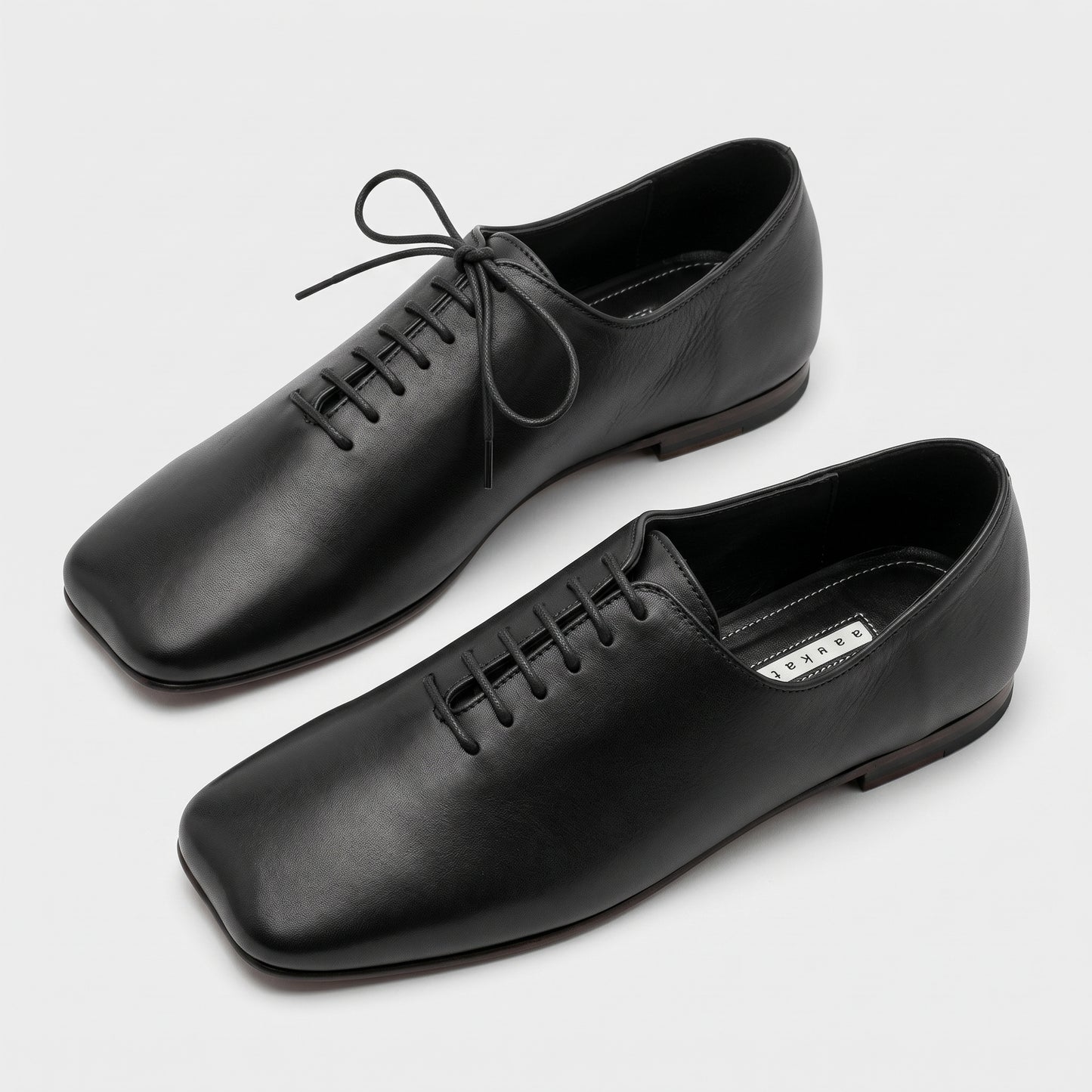 Minimalist Black Leather Oxfords