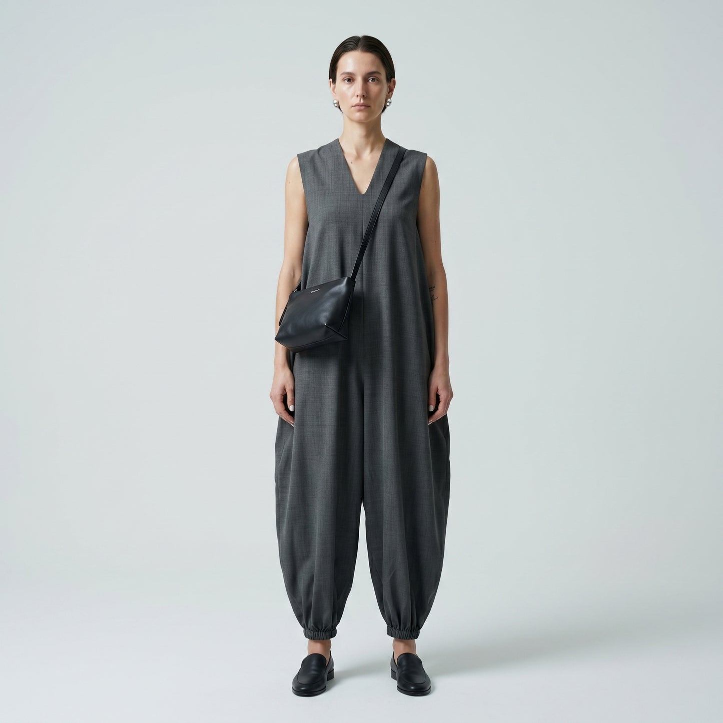 Architectural V-Neck Tapered Jumpsuit